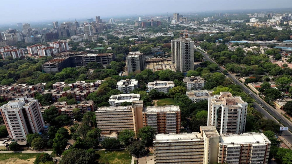 A captivating image showcasing the elegance and cultural richness of South Delhi, with its iconic landmarks, lush greenery, and bustling streets.